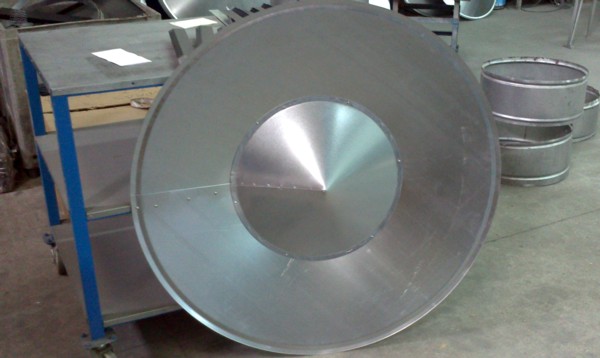 Tapa aguas antirebocante